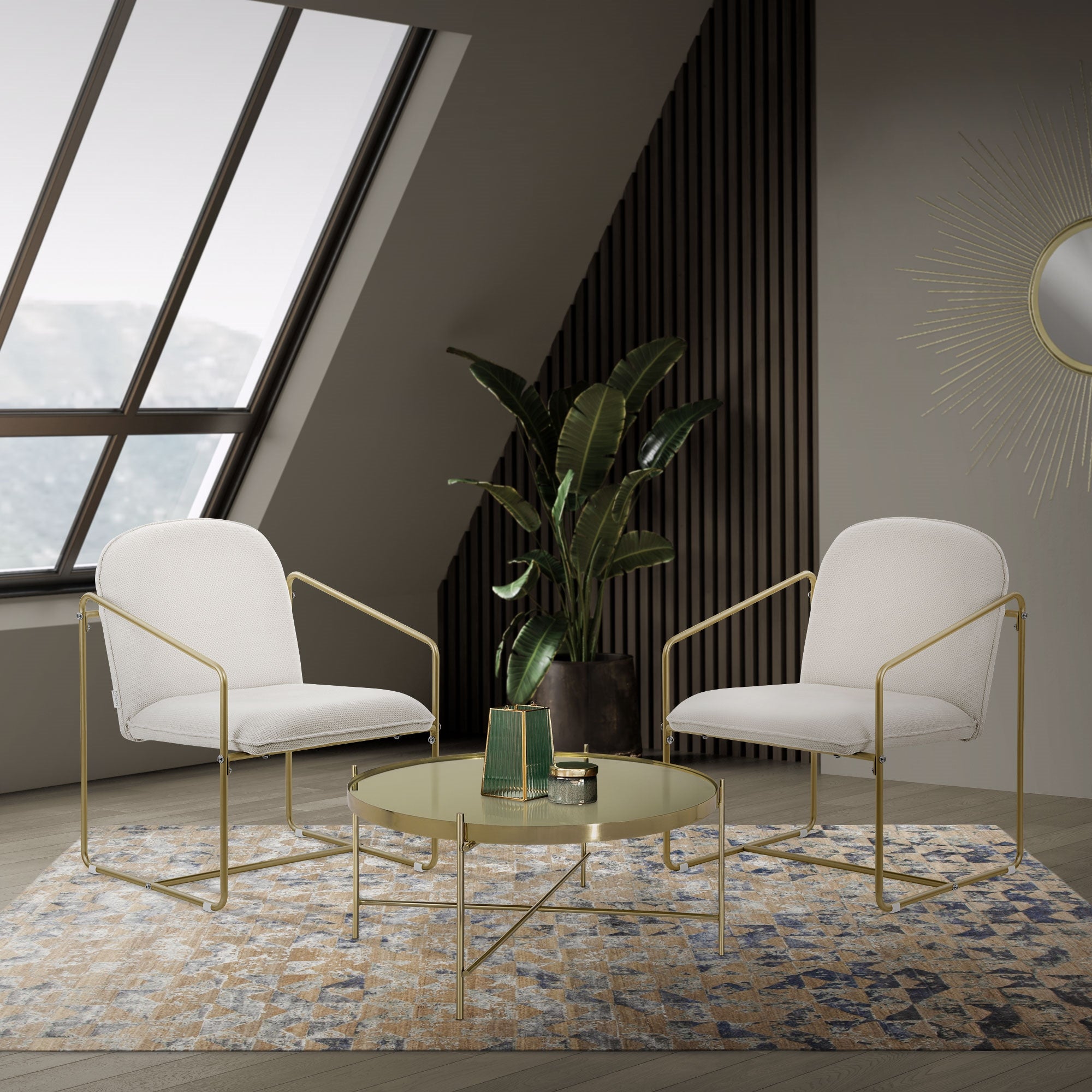 Two beige chairs and a round table in a modern room with plants.