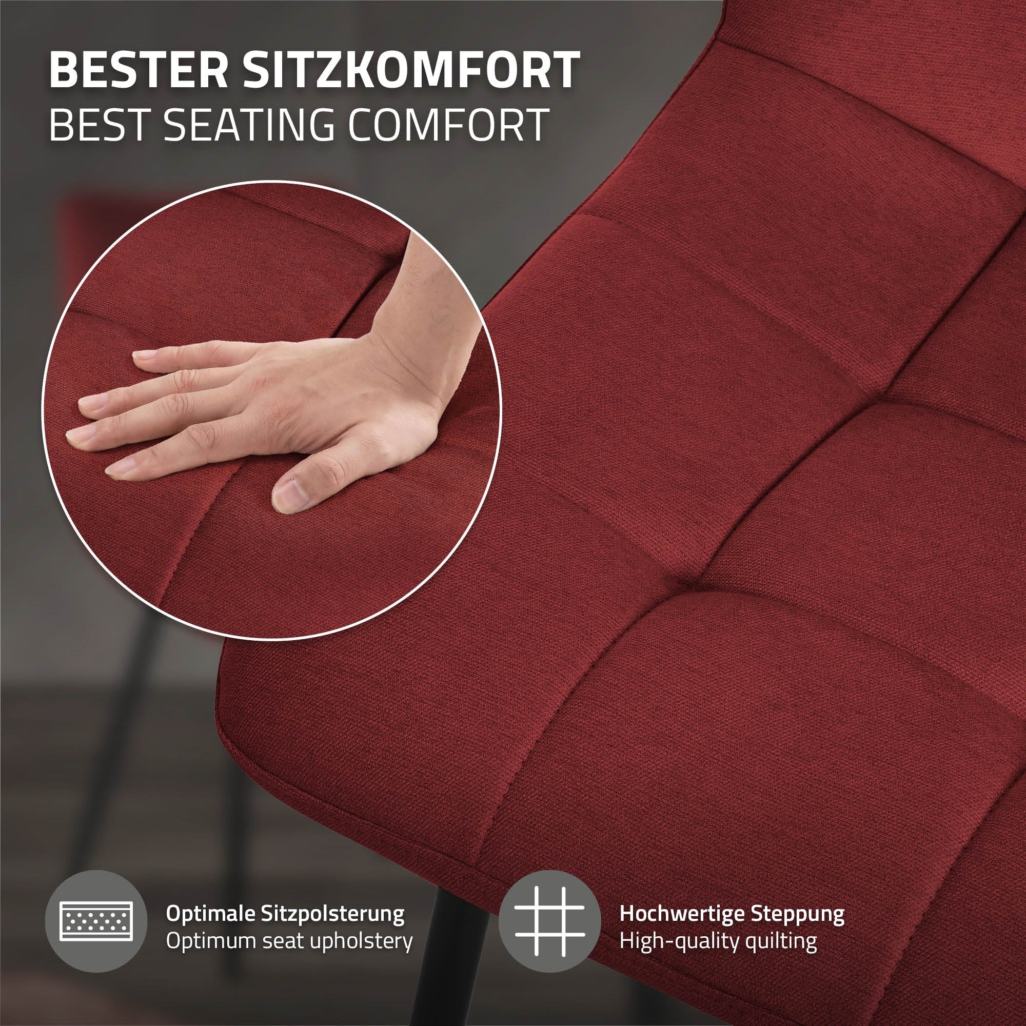 Primo piano di una mano su una sedia rossa con seduta imbottita.