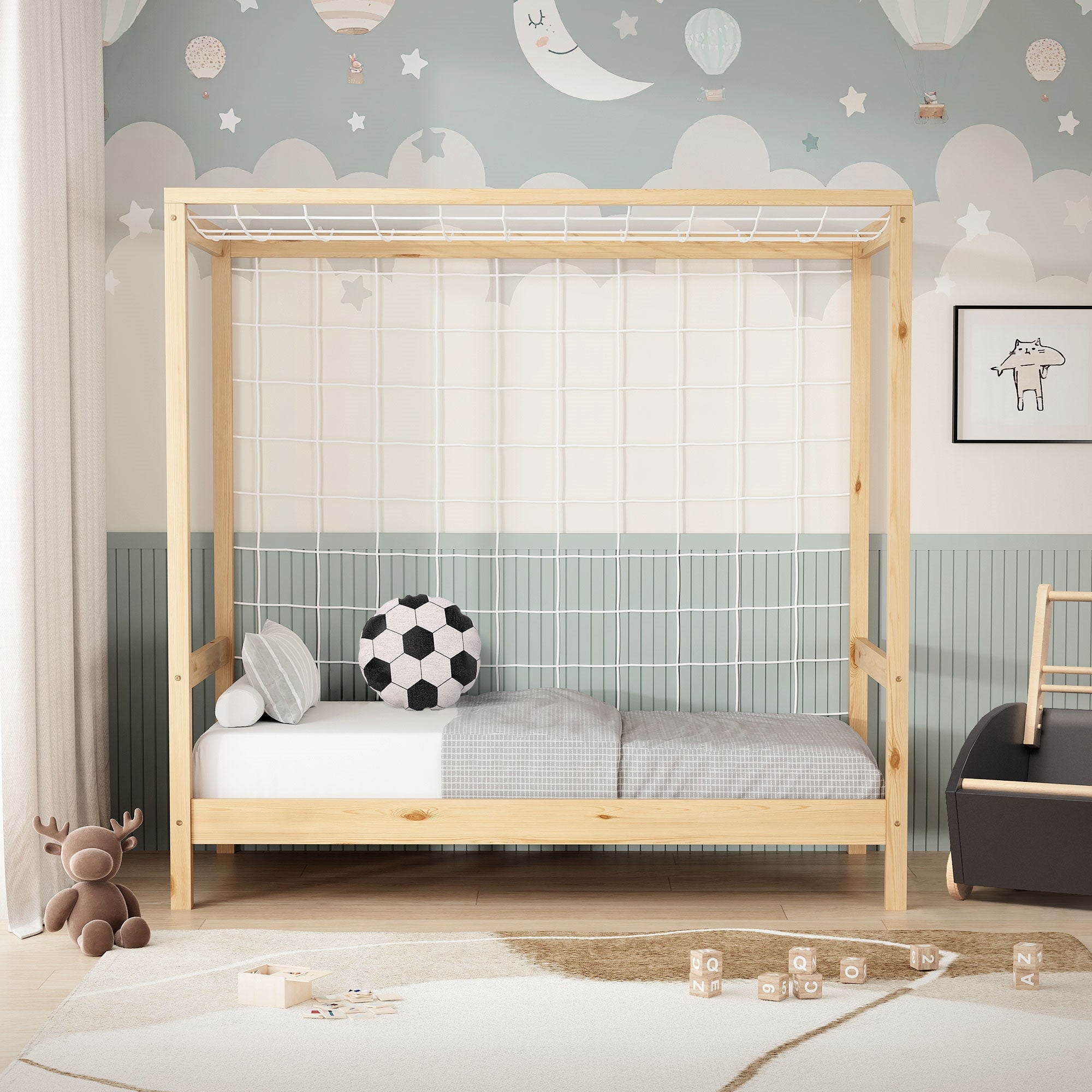 Bed with pillow and blanket in a children's room.