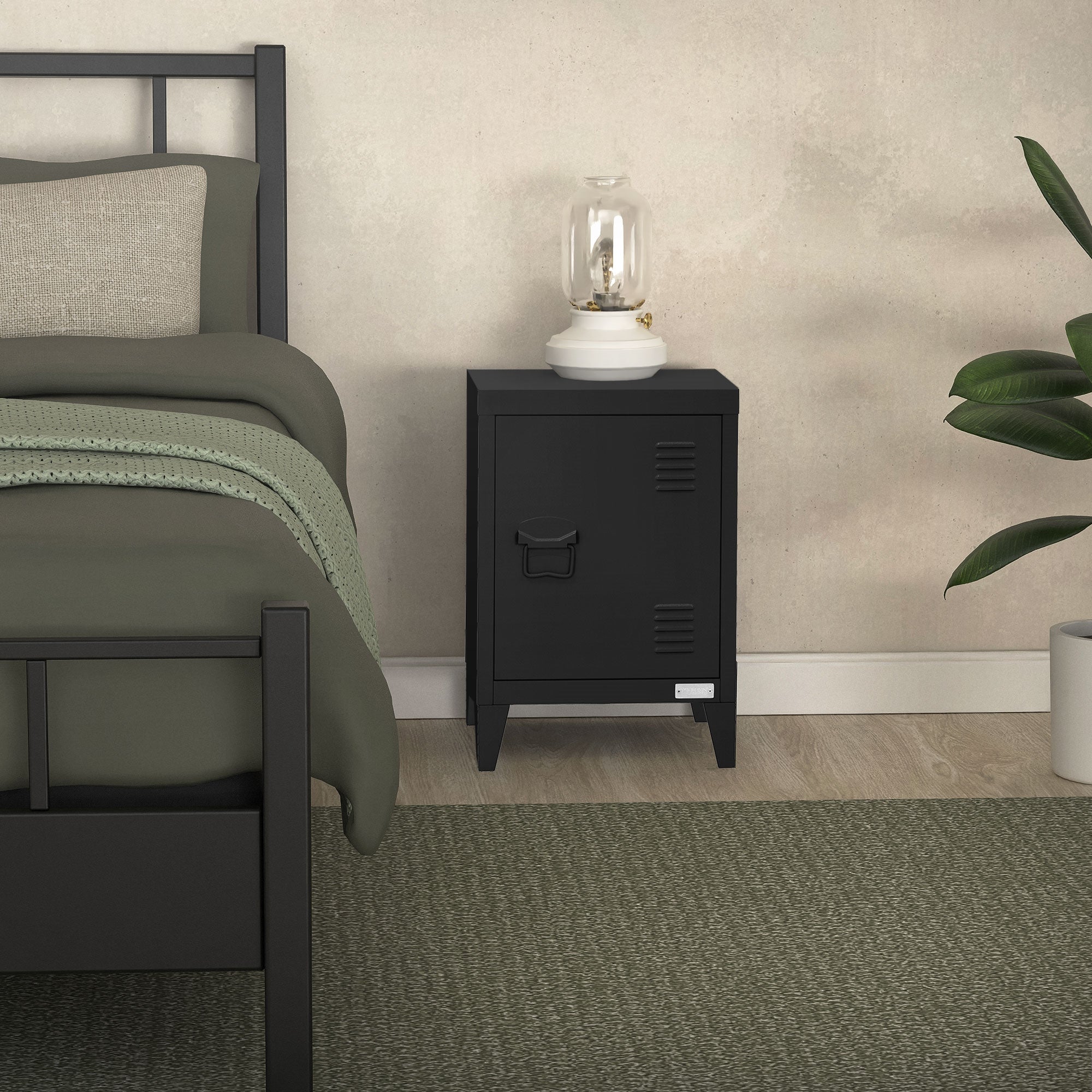 Black nightstand next to a bed with a lamp and a plant.