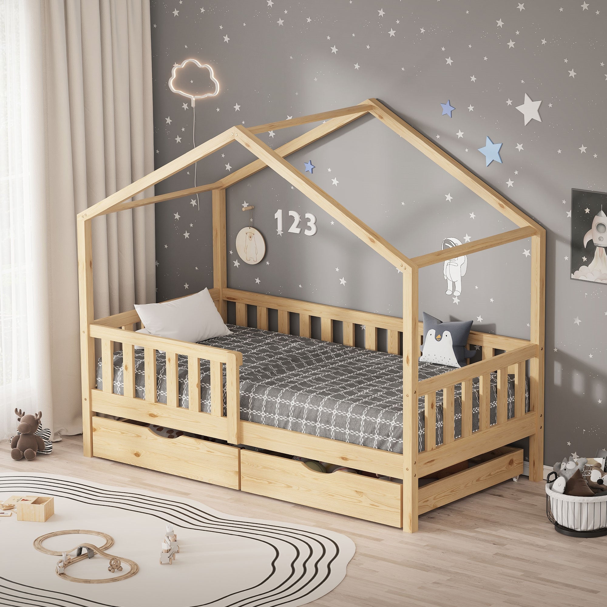 Bett mit Dachstruktur in einem Kinderzimmer, dekoriert mit Sternen.