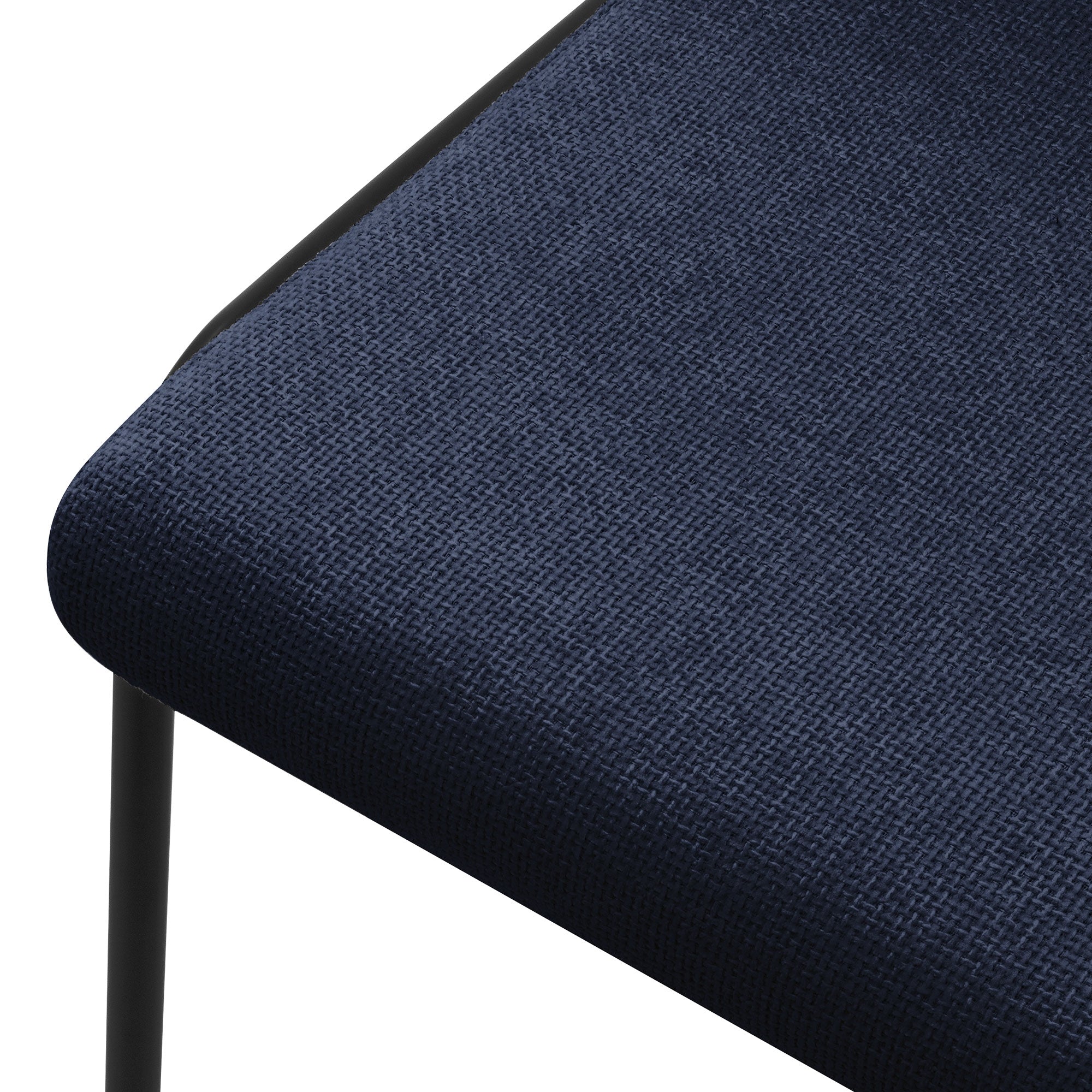 Close-up van de zitting van een blauwe stoel met textielbekleding.
