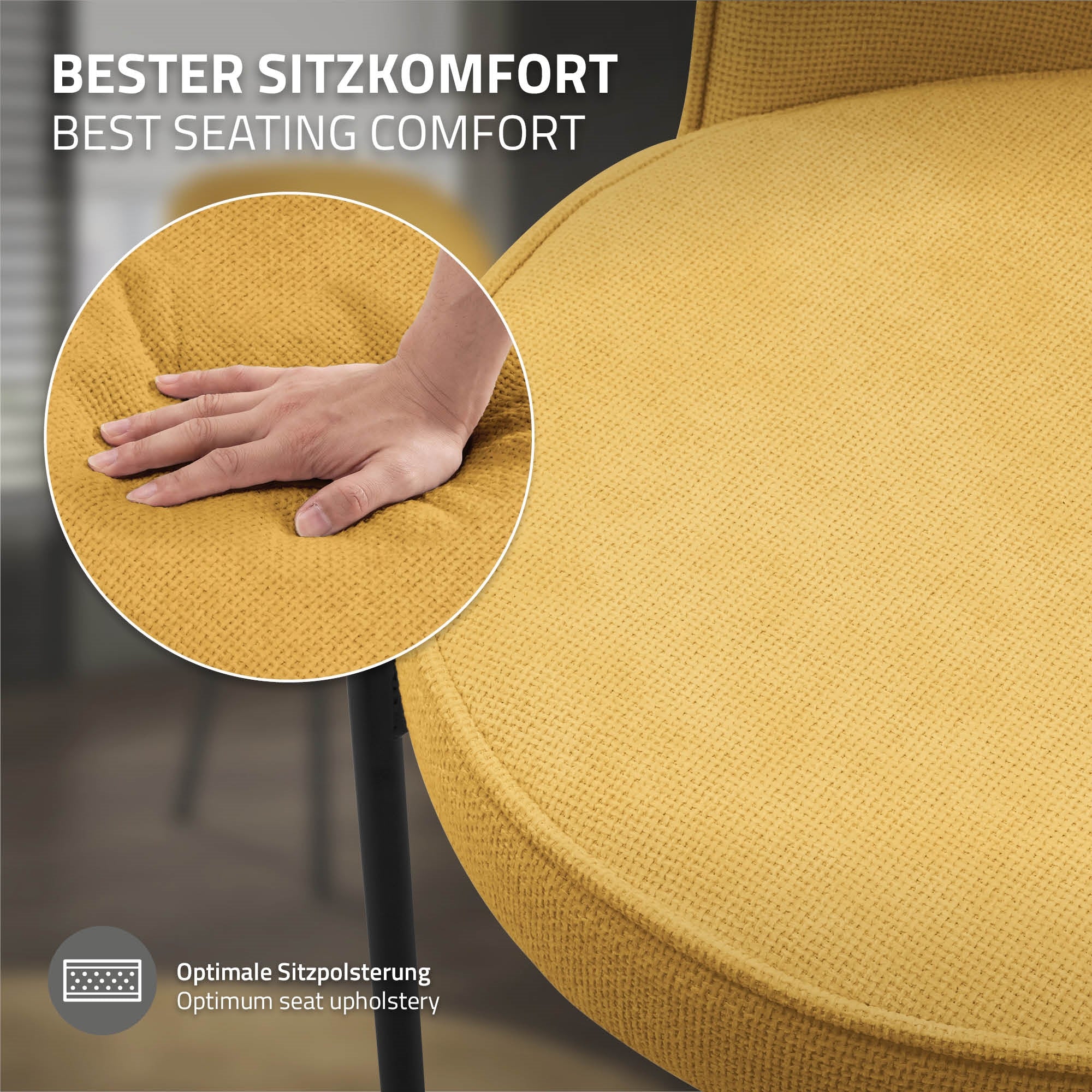 Nahaufnahme einer Hand auf einer gelben Stuhlpolsterung.