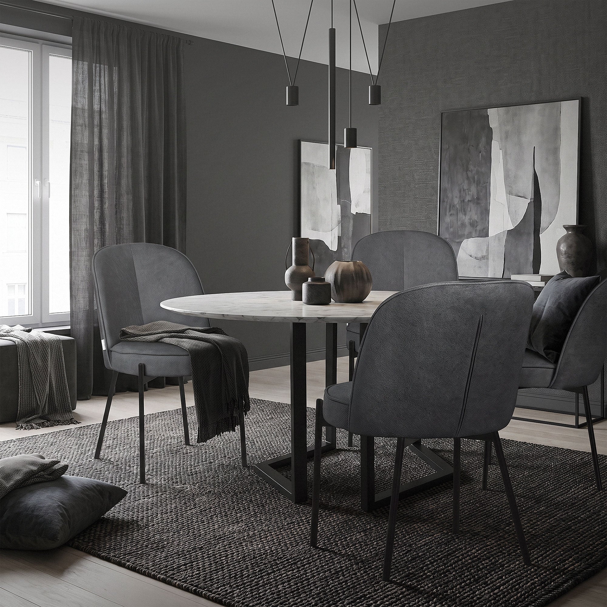 Sale da pranzo moderne con sedie grigie, un tavolo rotondo e decorazioni minimaliste.