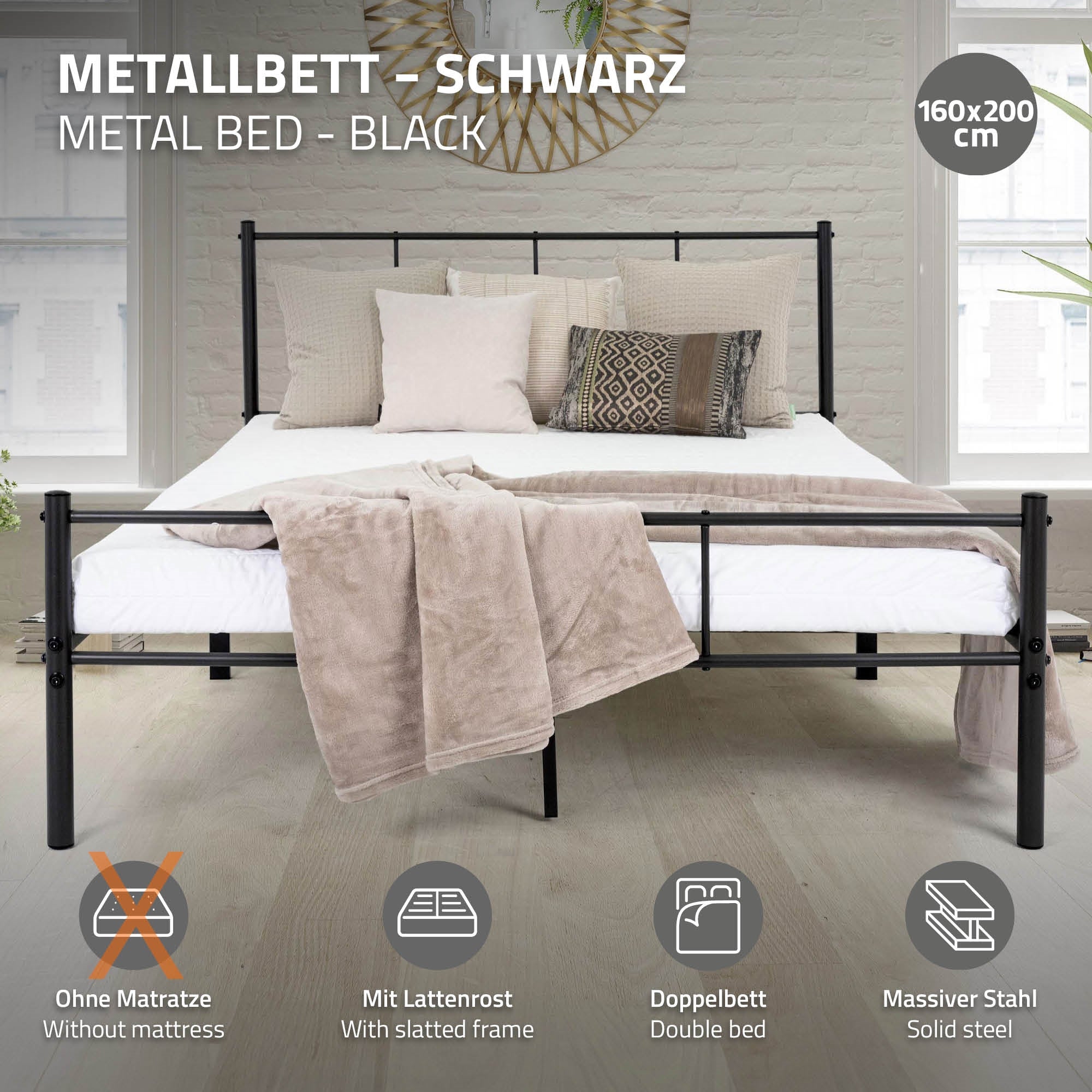 Een zwart metalen bed met een deken en kussens op een matras.
