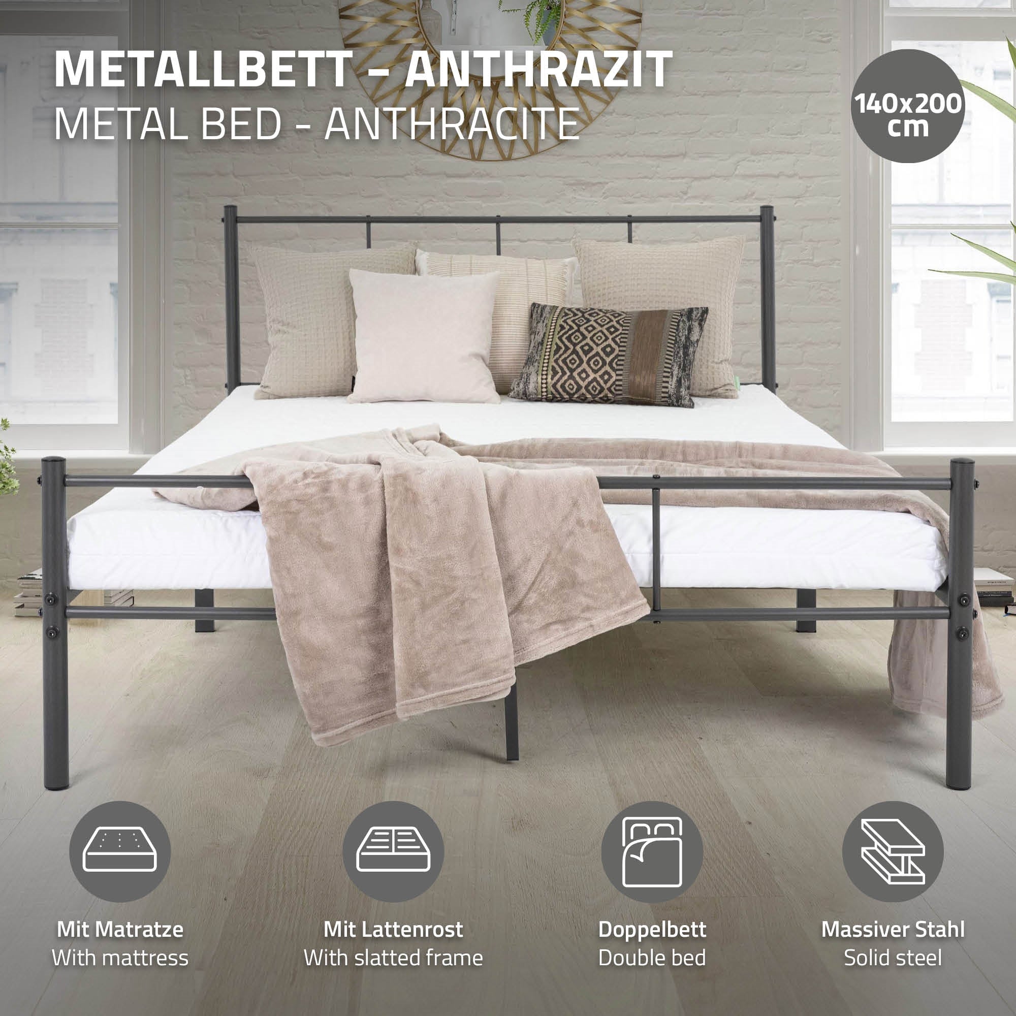 Metallipeti antrasiitinvärisenä, patjan ja vuodevaatteiden kanssa.