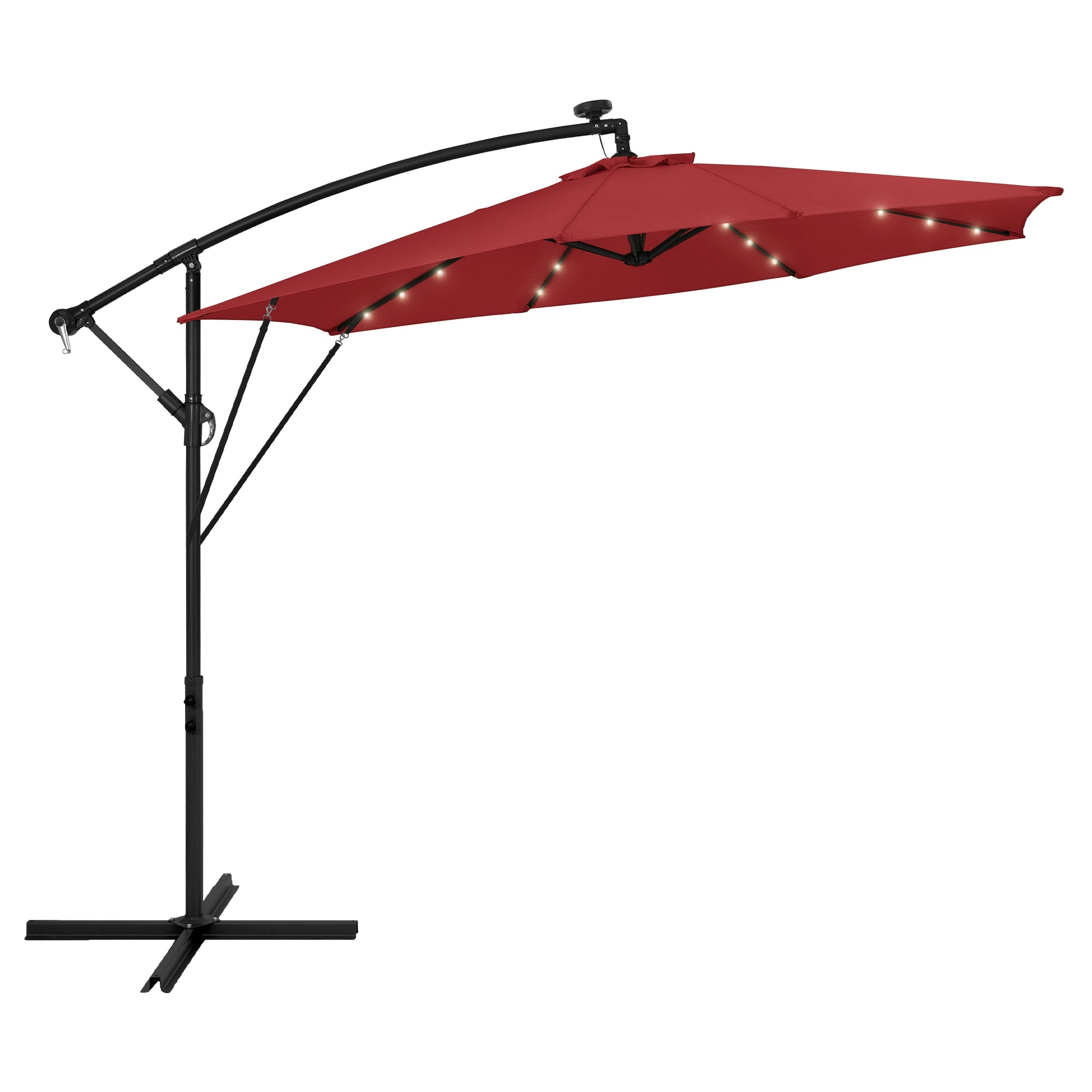 Ombrellone rosso con illuminazione, aperto e all'aperto.