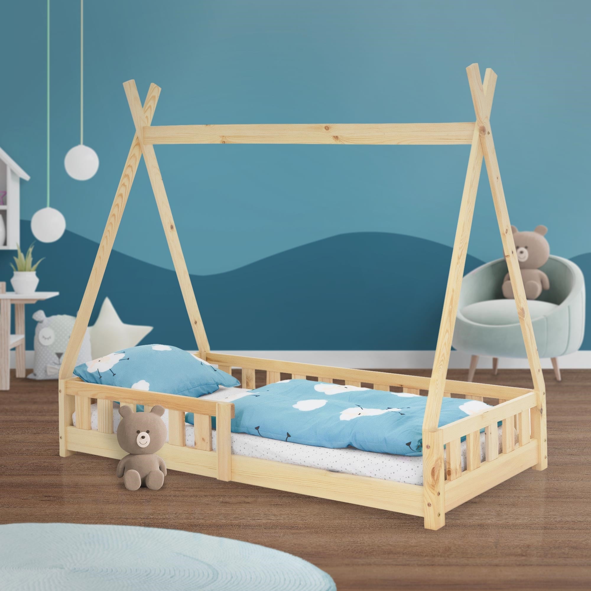 Bed with two pillows and a plush toy in a children's room.