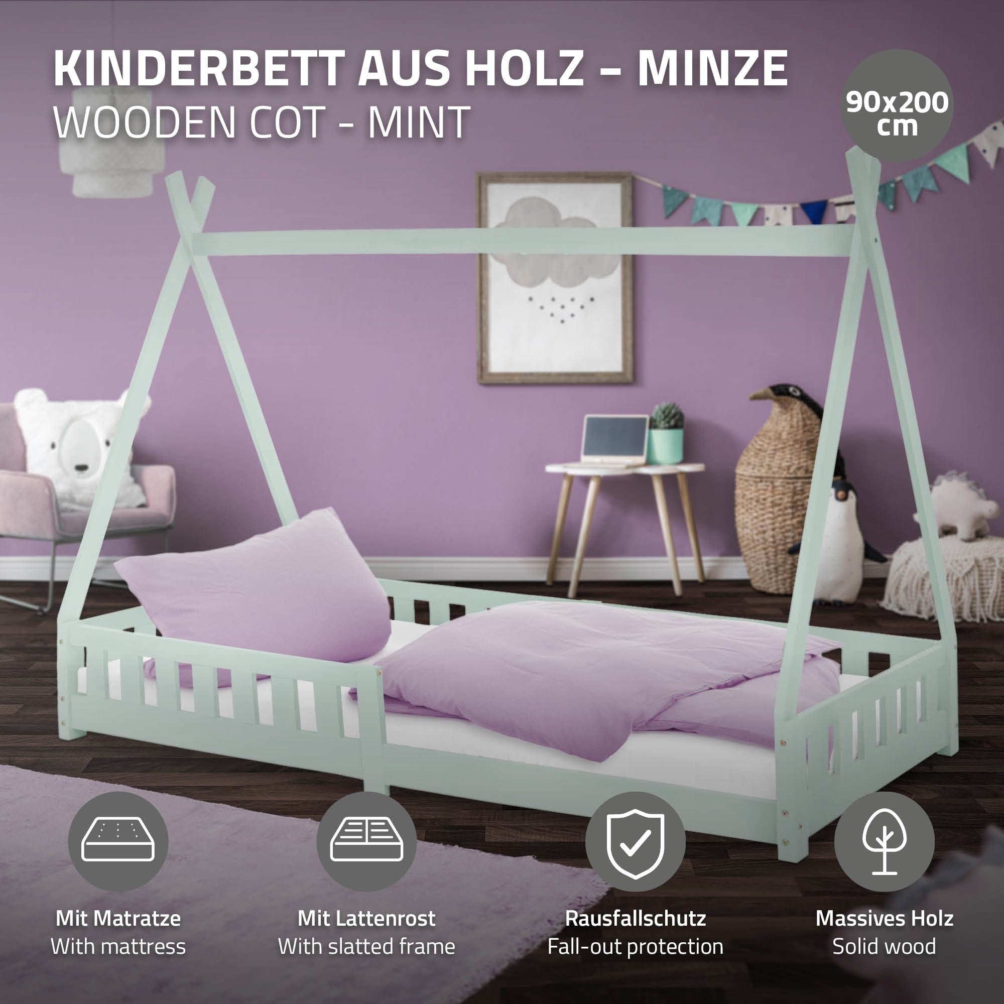 Kinderbett aus Holz in mint, mit zwei Kissen und Rausfallschutz.