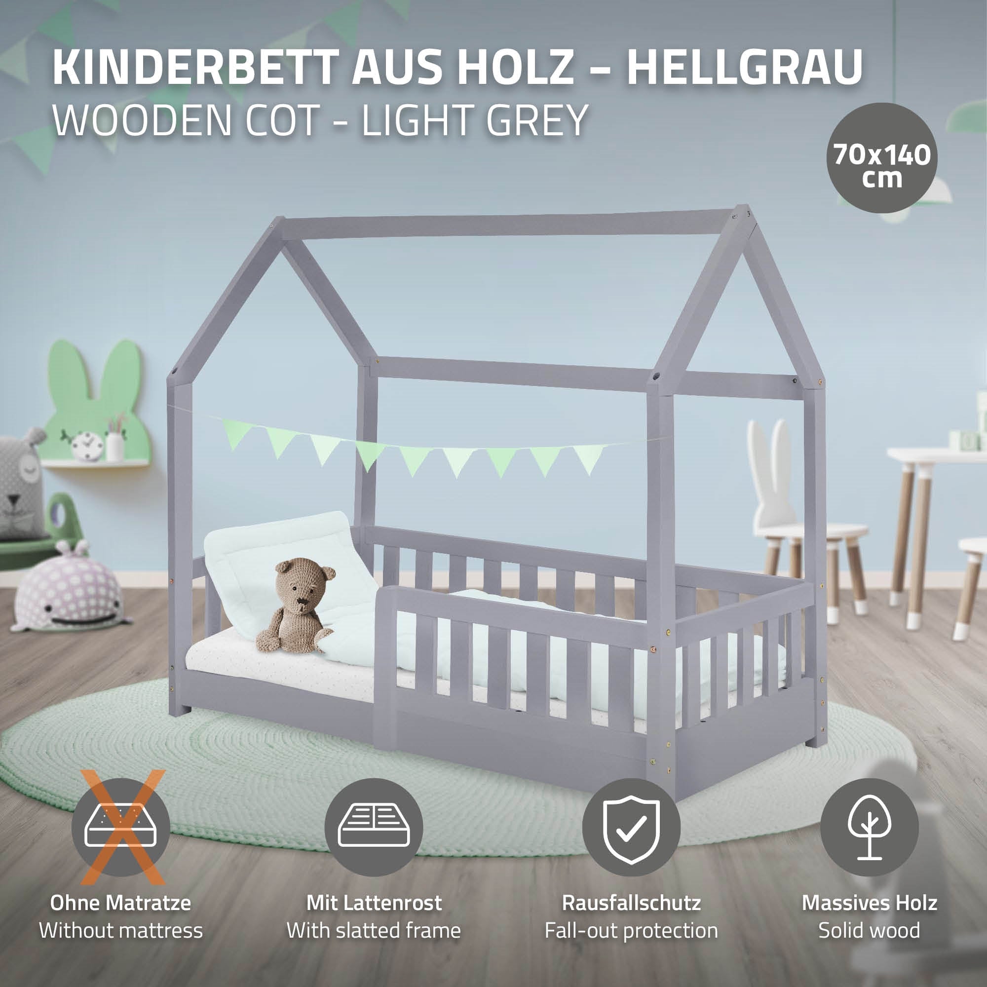 Lit en bois pour enfants en gris clair avec un animal en peluche sur le matelas.
