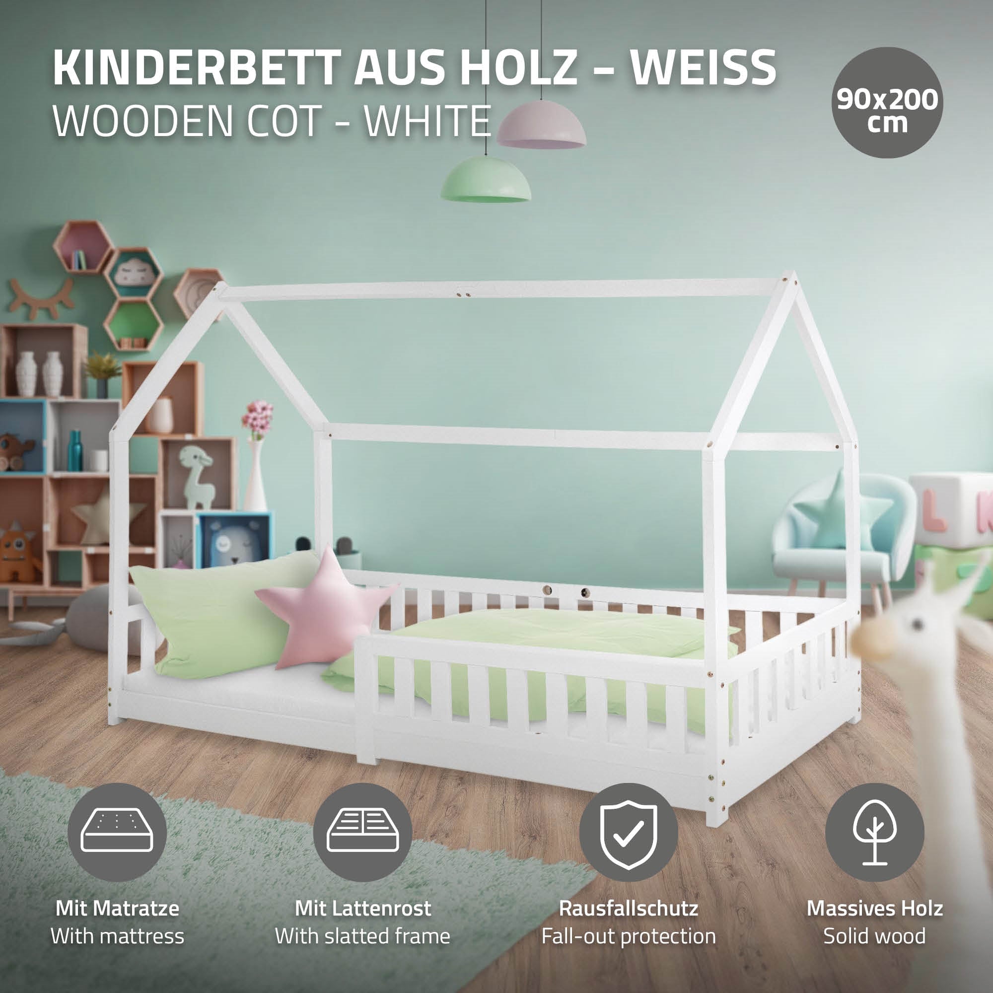 Valkoinen puinen lasten sänky patjalla ja putoamissuojalla.