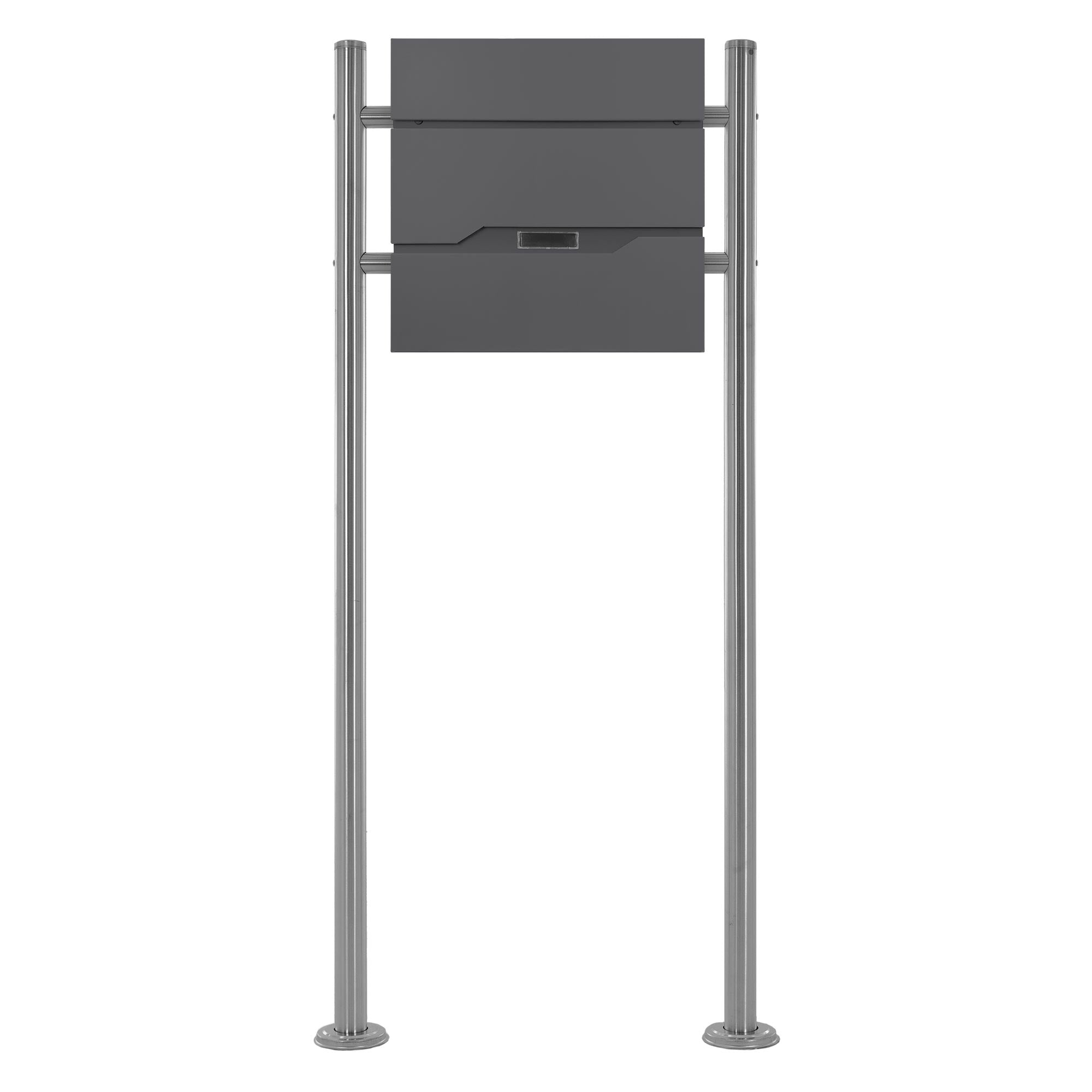 A freestanding mailbox with two compartments and a top lid.