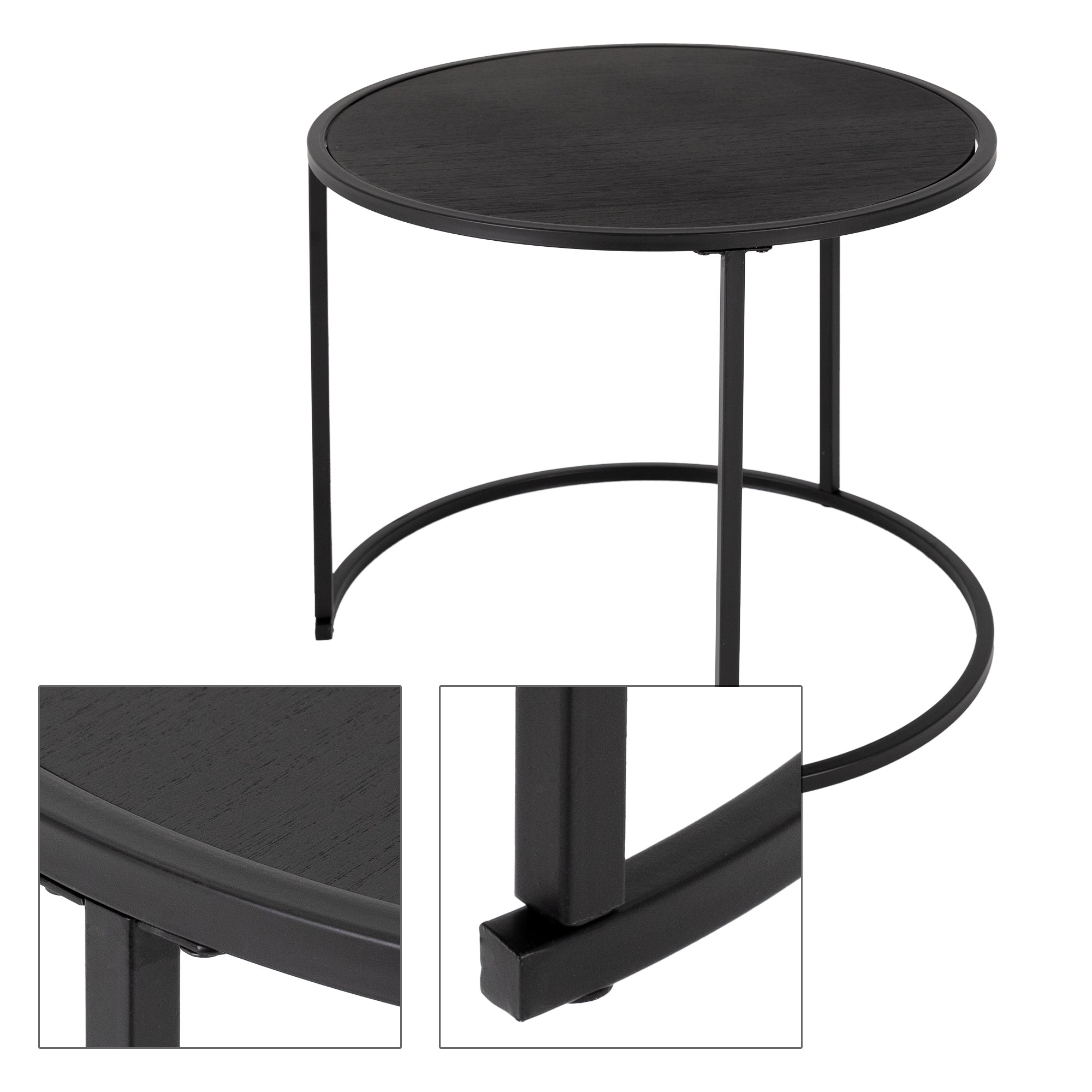 Kulatý černý stůl s minimalistickým designem.