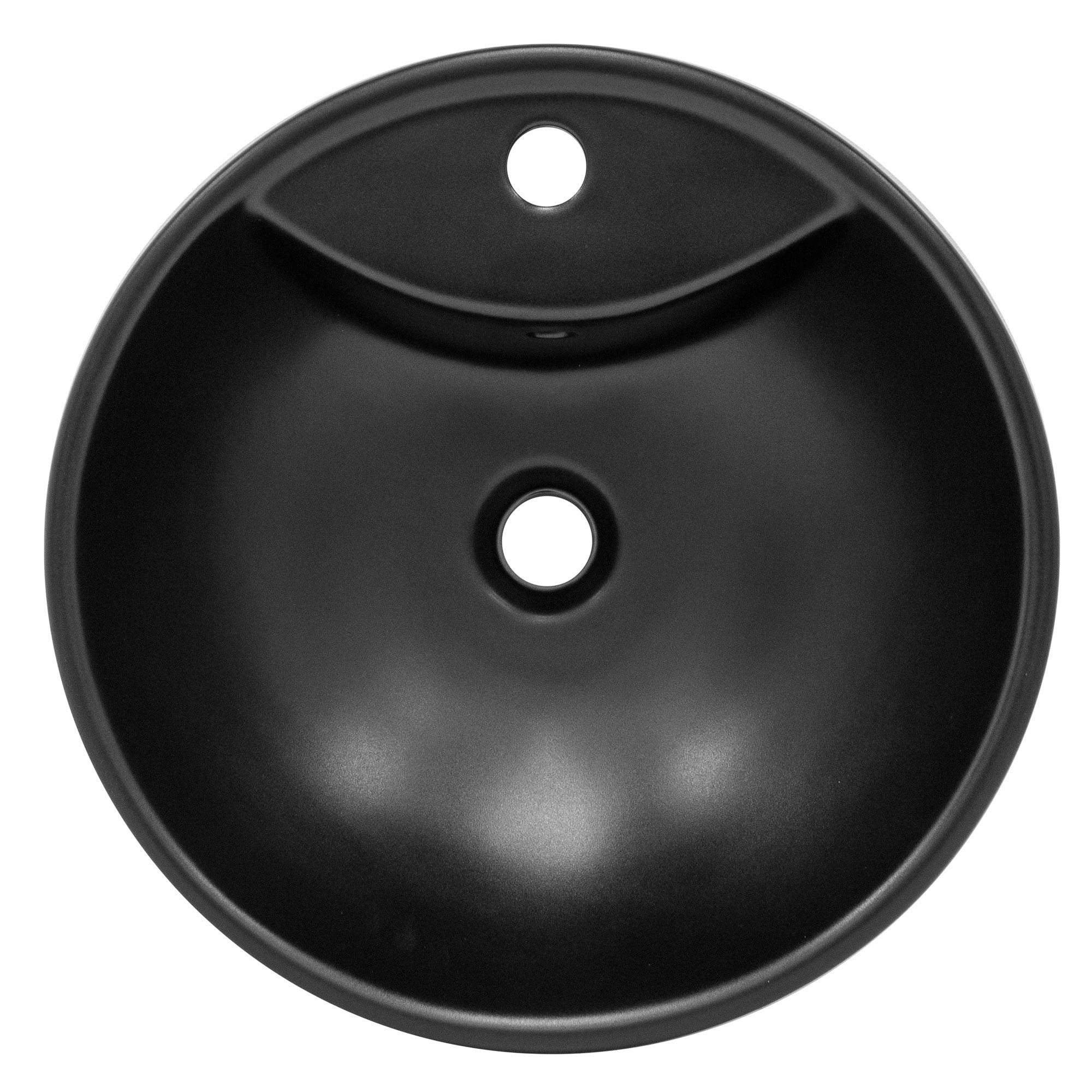 Vista dall'alto di un lavabo rotondo nero con foro di scarico.