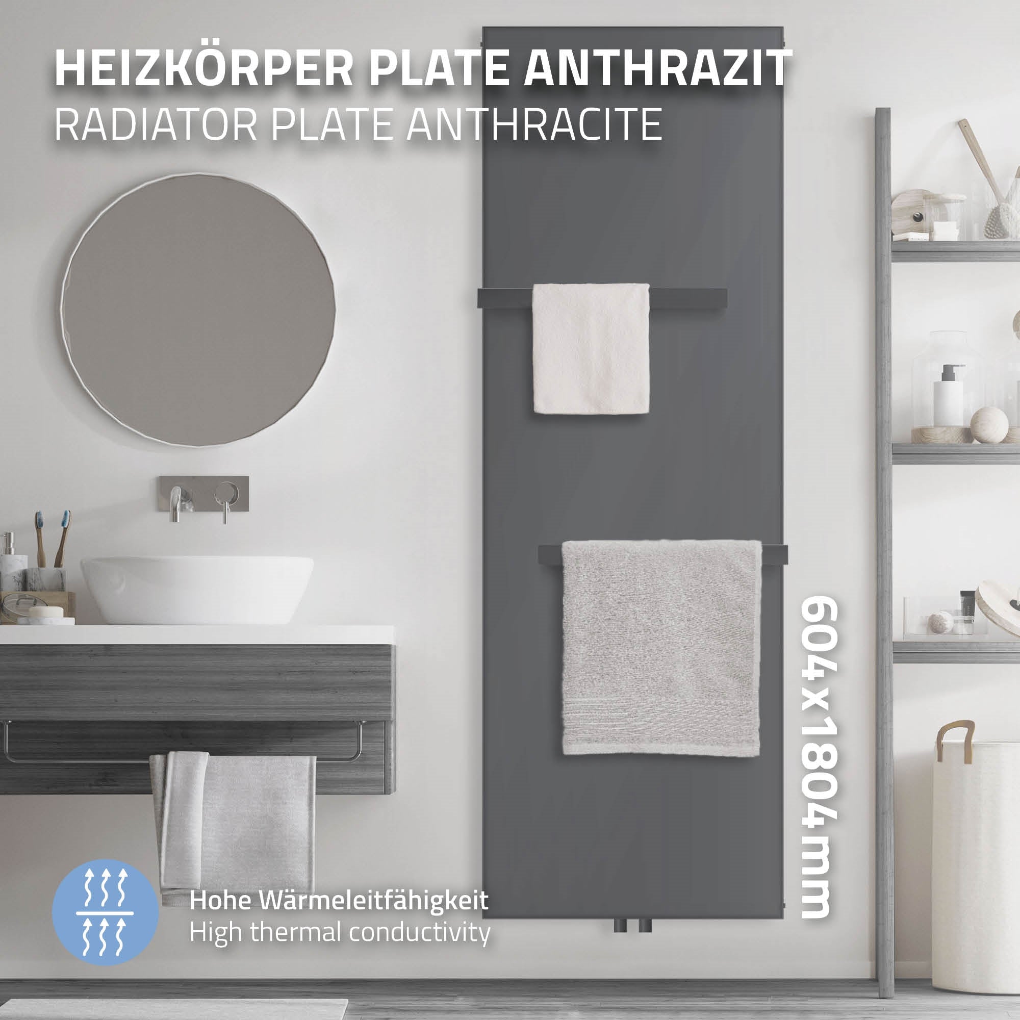 Radiatore color antracite, specchio e mobili da bagno sullo sfondo.