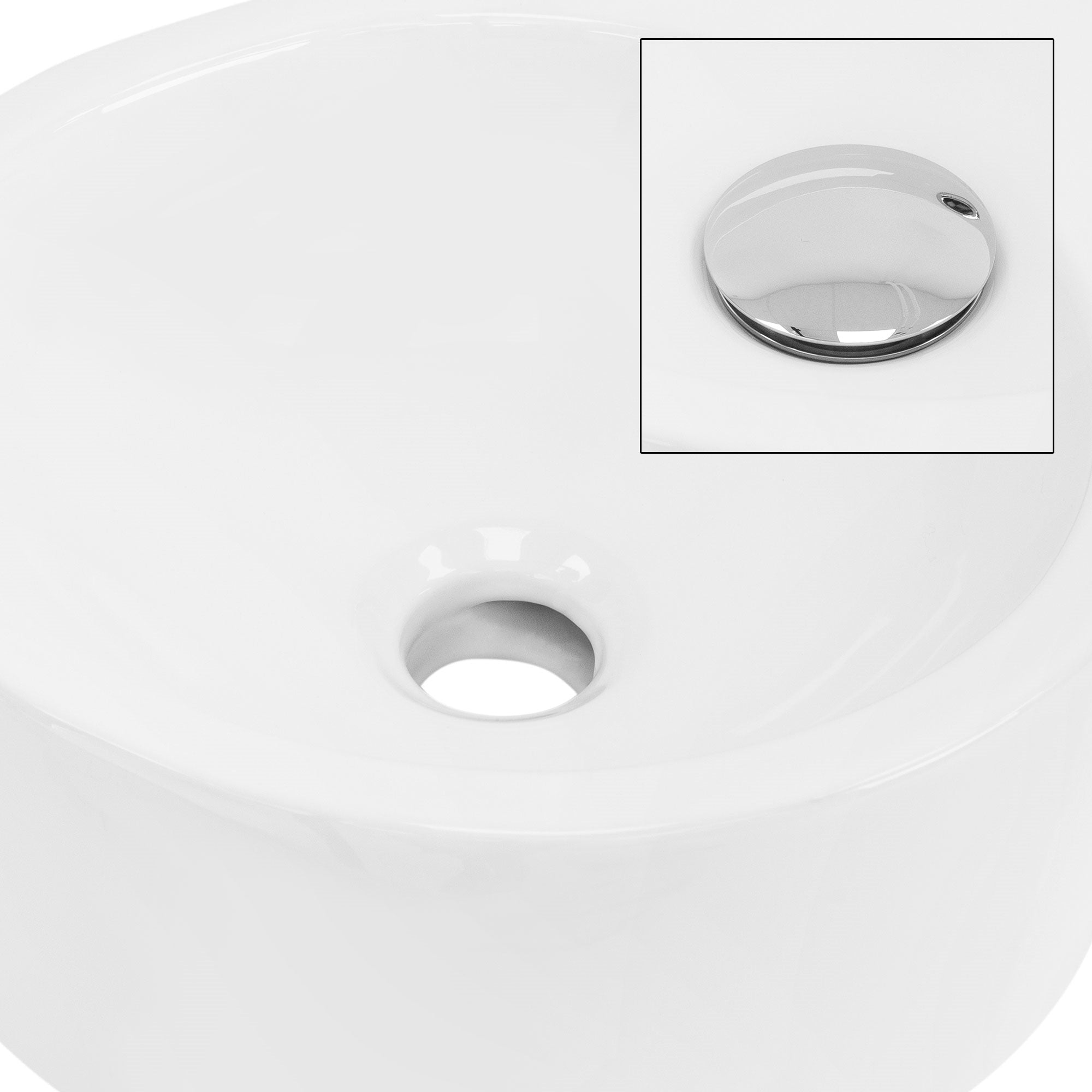 Lavabo bianco con incavo rotondo e copertura cromata.