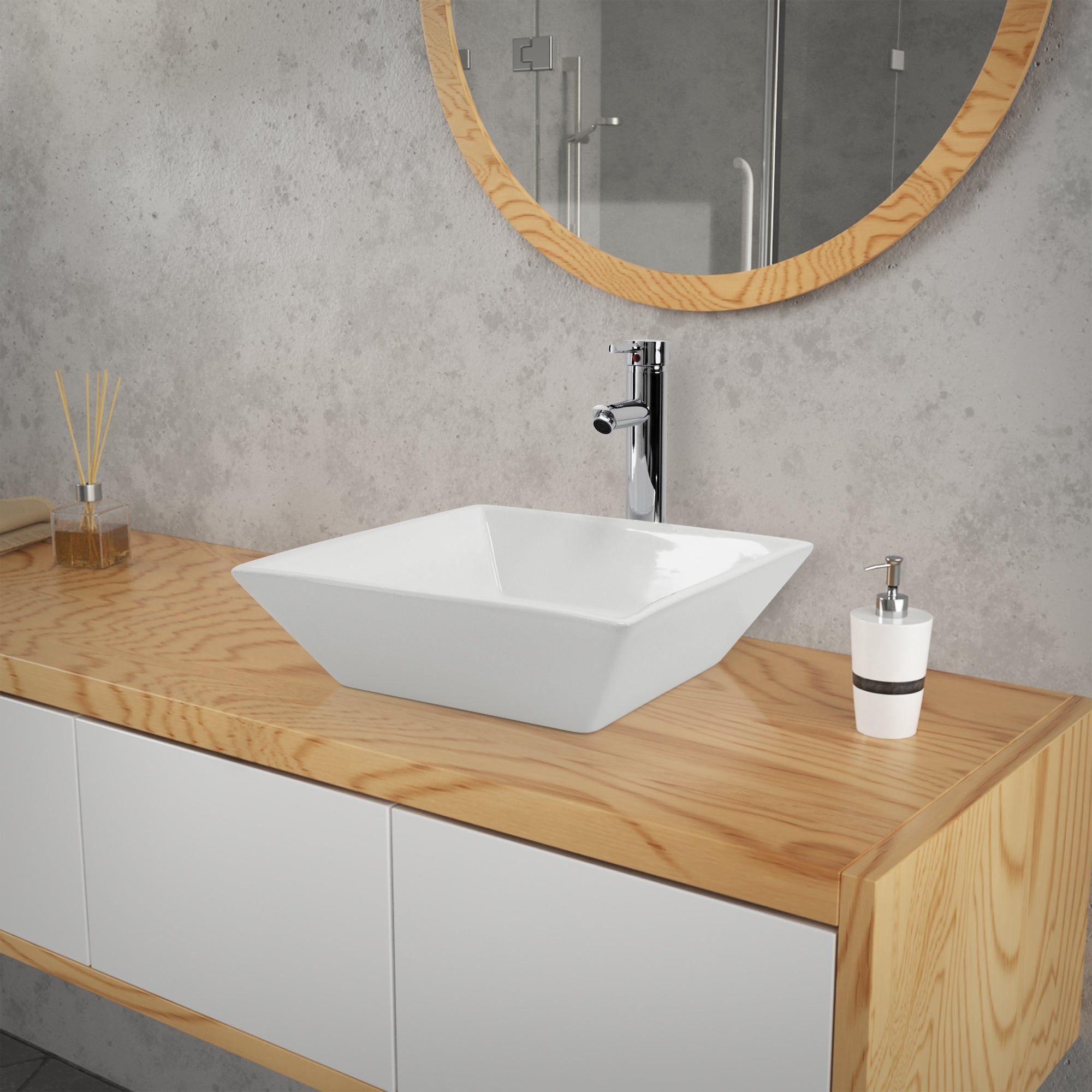 Lavabo blanco sobre un armario de madera, espejo redondo encima.