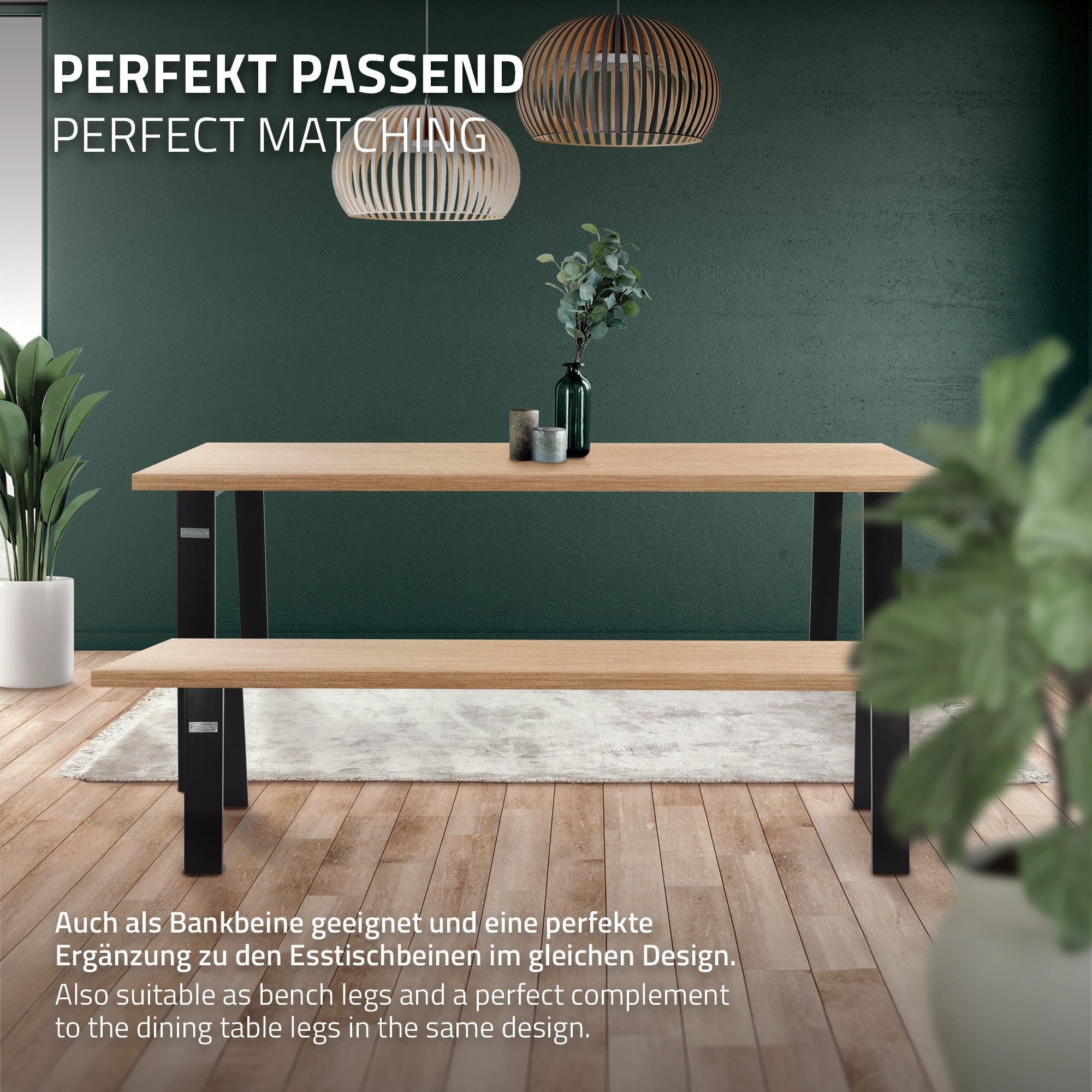 Table en bois avec pieds en métal noir et une plante sur la table devant un fond vert.