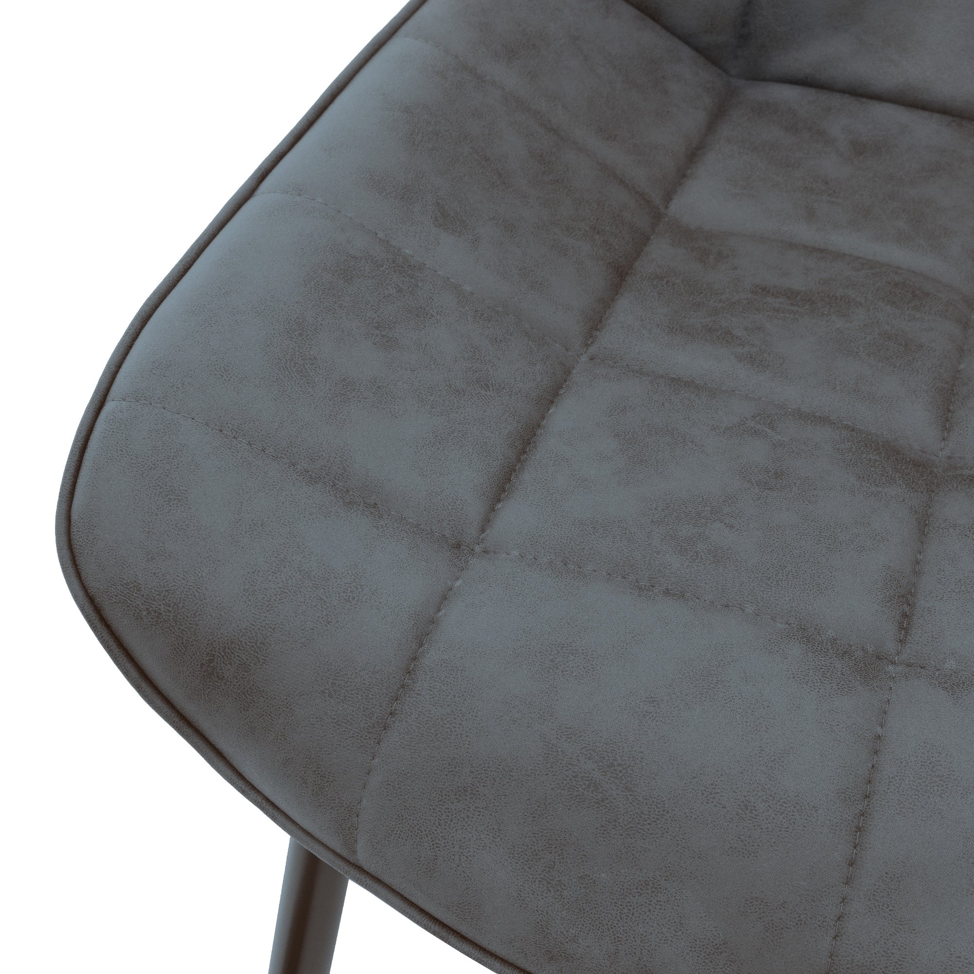 Gros plan d'une chaise grise avec assise rembourrée.