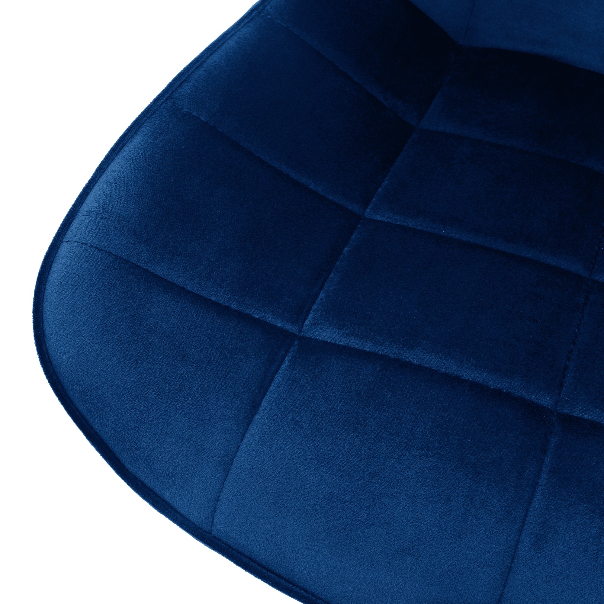 Primer plano del asiento de una silla azul con tapizado acolchado.