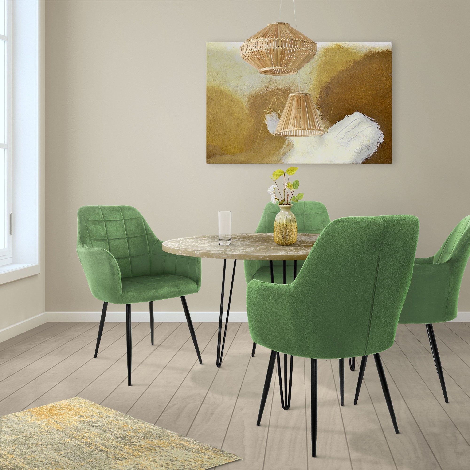 A dining room with a round table and four green chairs. A painting on the wall.